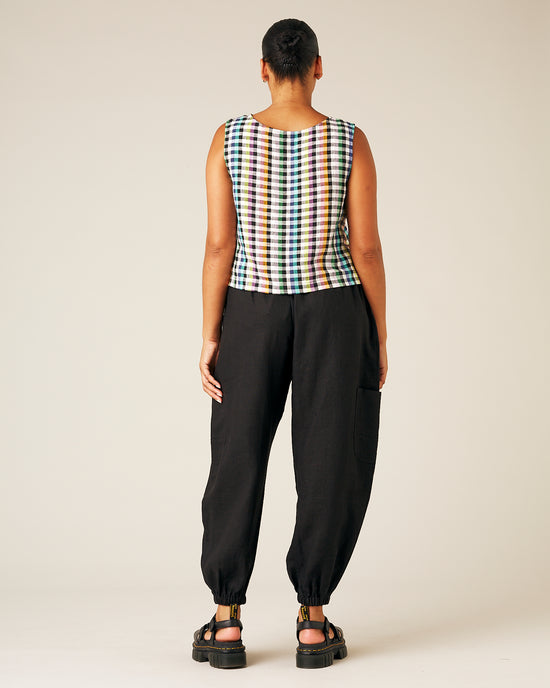 model wears black linen yoli trousers