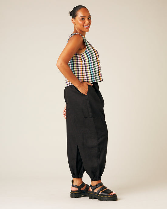 model wears black linen yoli trousers