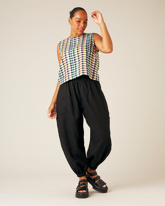 model wears black linen yoli trousers