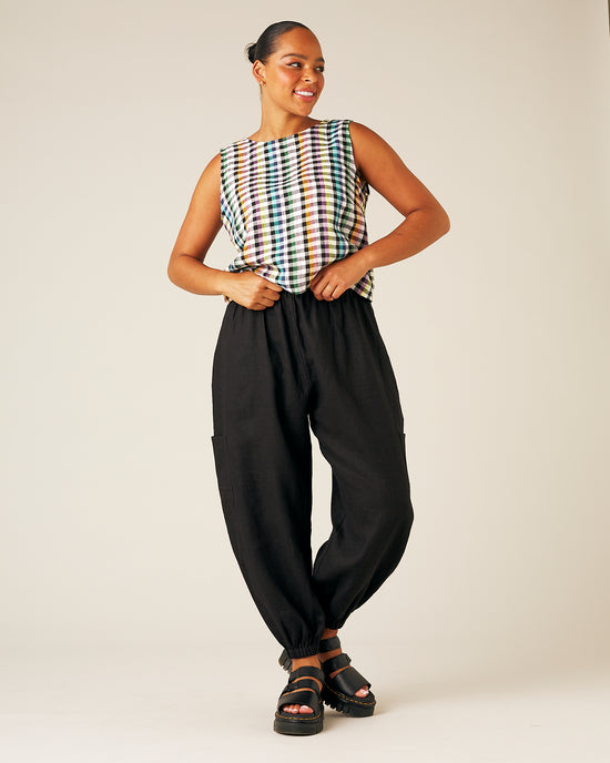 model wears black linen yoli trousers