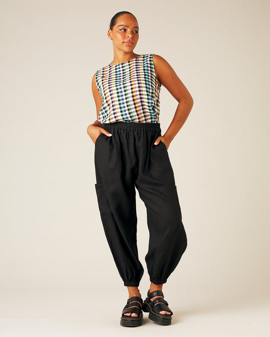 model wears black linen yoli trousers