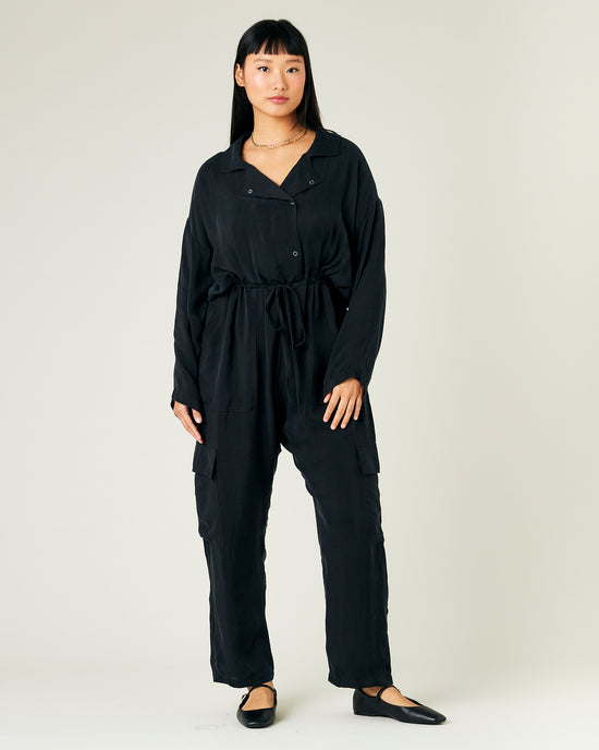 model wears black cupro mila coverall