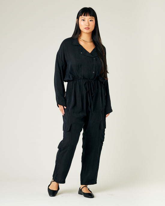 model wears black cupro mila coverall