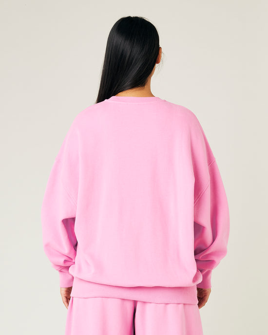 model wears pink jersey riley jumper