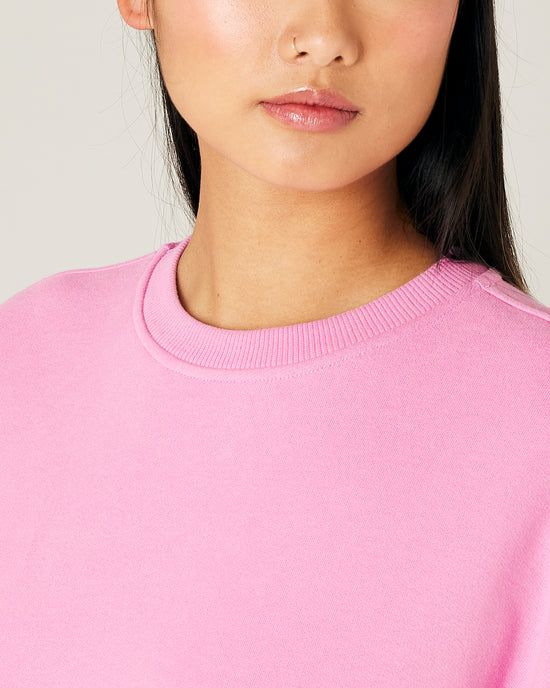 model wears pink jersey riley jumper