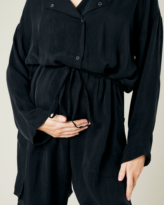 pregnant model wears black cupro mila coverall