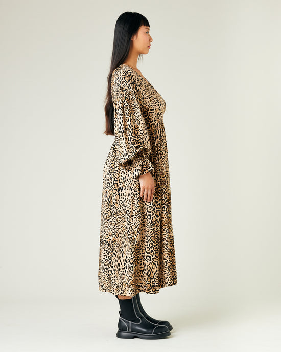 model wears leopard print cupro finley dress