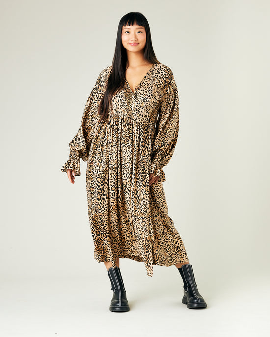 model wears leopard print cupro finley dress