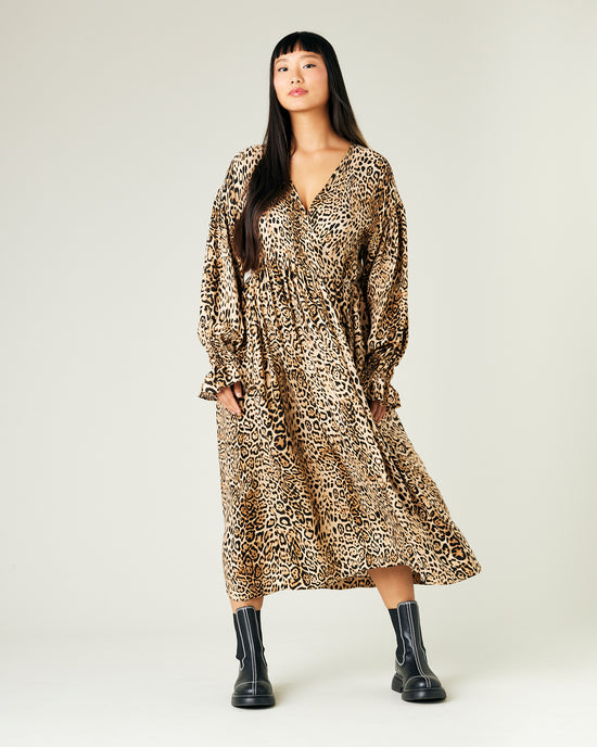 model wears leopard print cupro finley dress