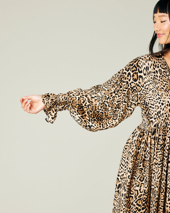 model wears leopard print cupro finley dress