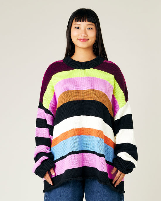 model wears striped knitted avery jumper