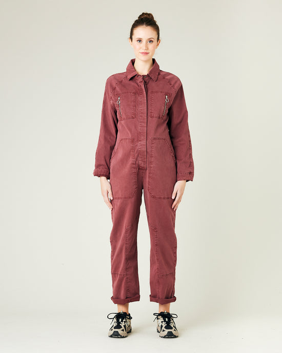 pregnant model wears wine hallie coverall