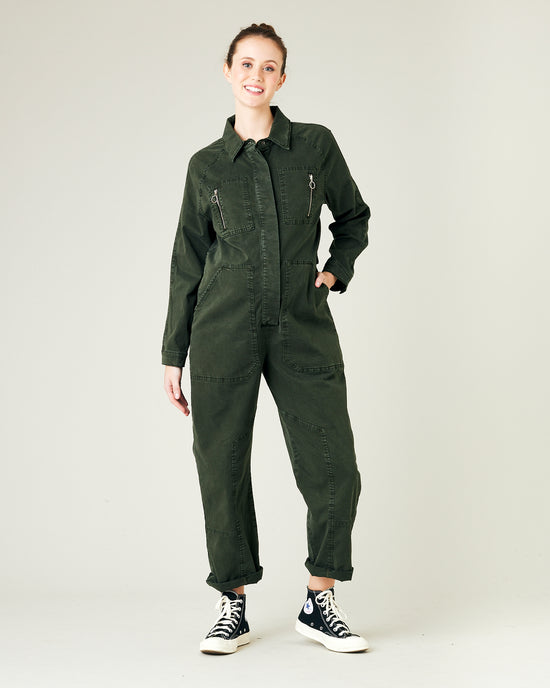 pregnant model wears sea green hallie coverall