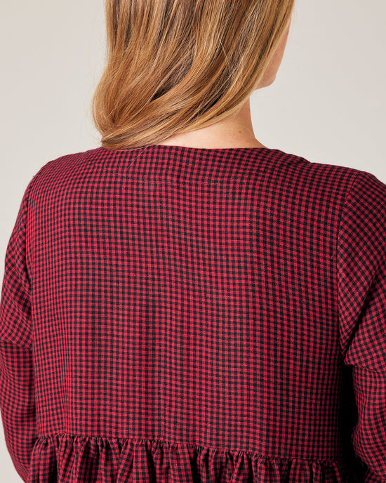 model wears red and black gingham linen willow dress