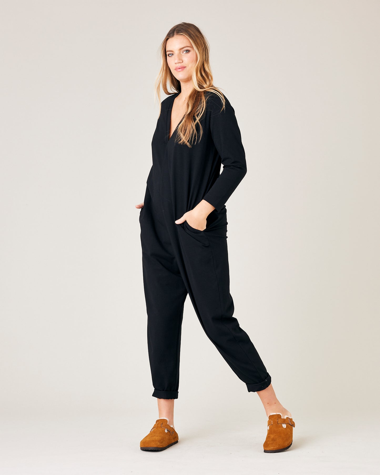 model wears black jersey milly jumpsuit