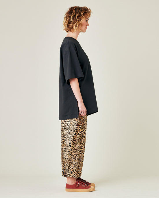 model wears leopard print cupro mabel trousers