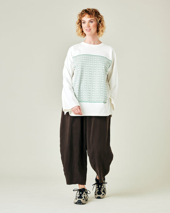 model wears espresso cupro mabel trousers