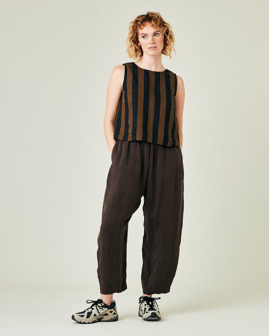 model wears espresso cupro mabel trousers