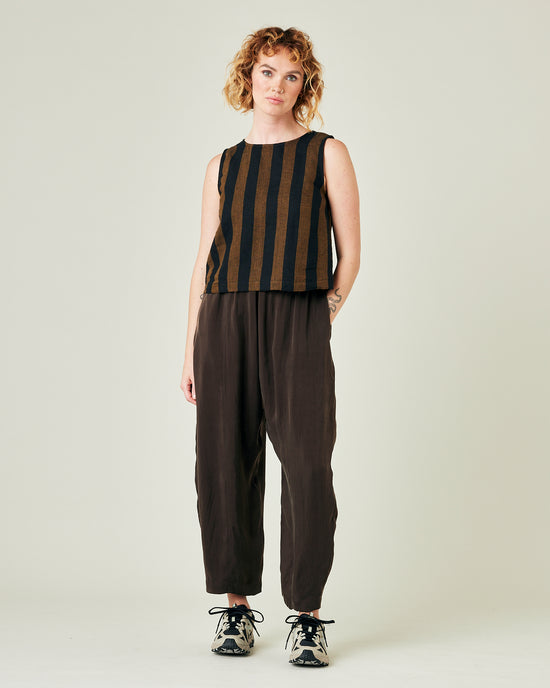 model wears espresso cupro mabel trousers