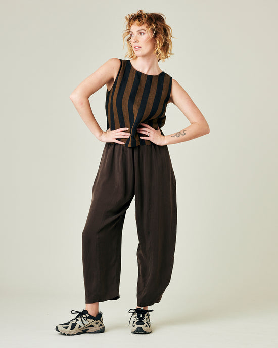 model wears espresso cupro mabel trousers