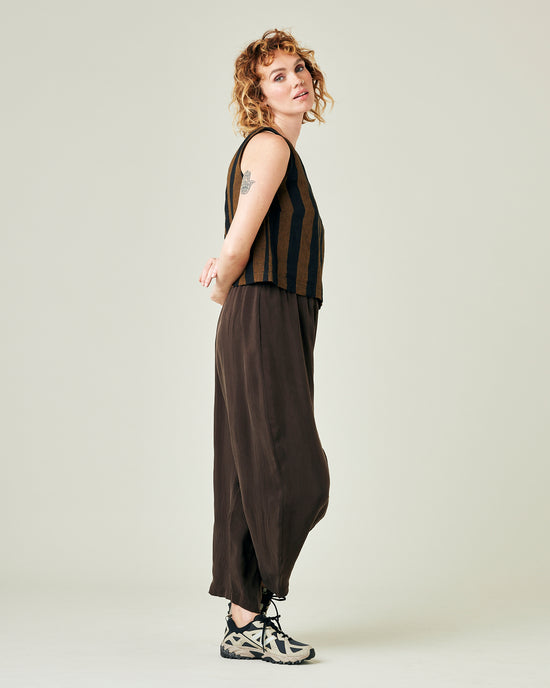 model wears espresso cupro mabel trousers