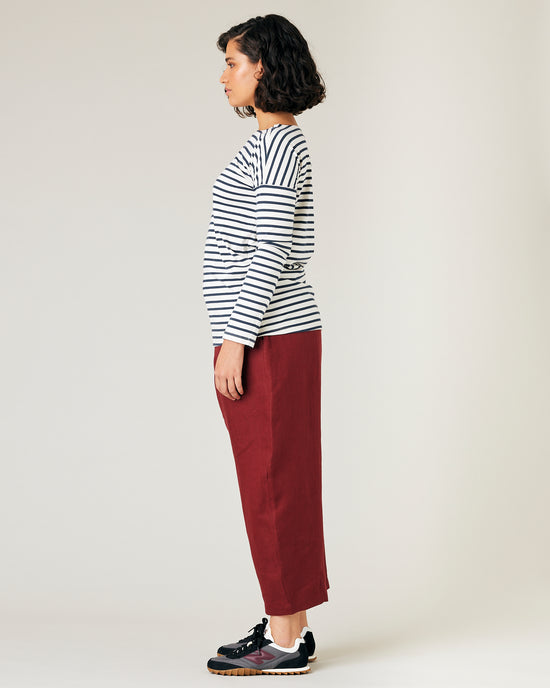 model wears brick linen mabel trousers