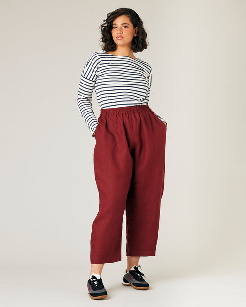 model wears brick linen mabel trousers