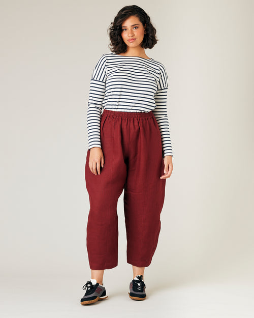 model wears brick linen mabel trousers