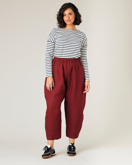 model wears brick linen mabel trousers