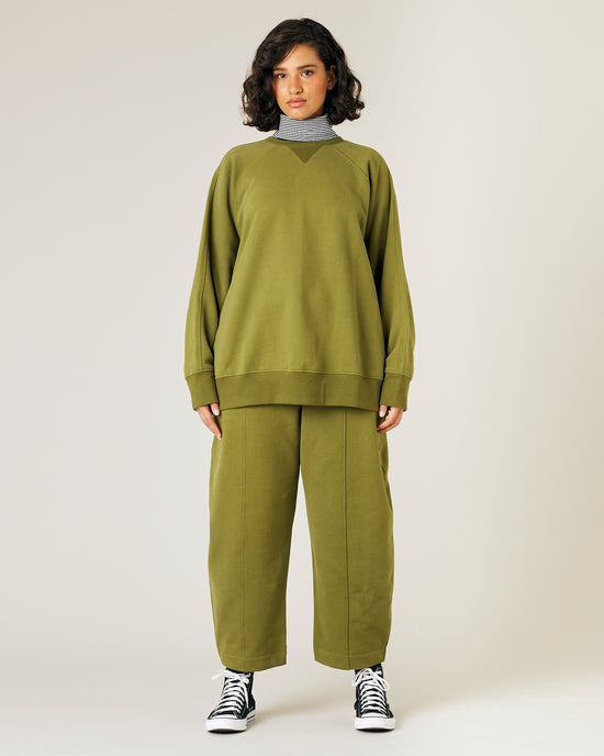 model wears avocado fleece jersey hugh jumper