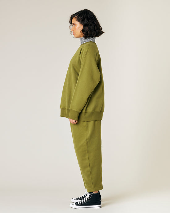 model wears avocado fleece jersey hugh jumper