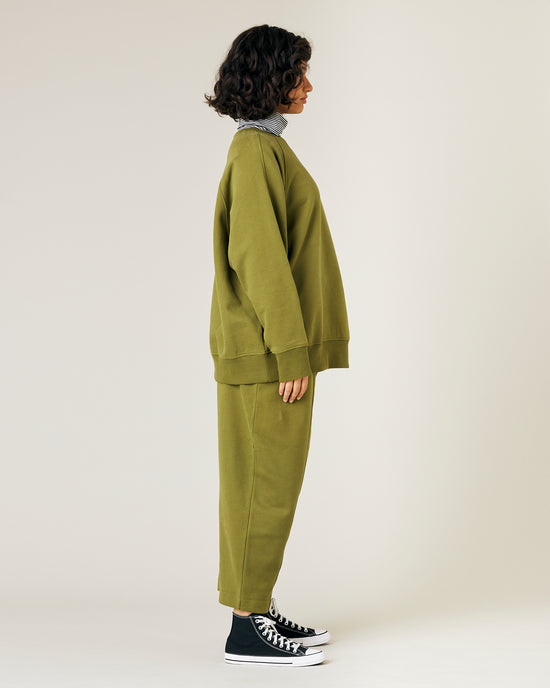 model wears avocado fleece jersey hugh jumper