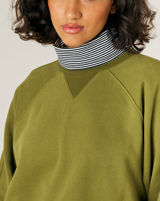 model wears avocado fleece jersey hugh jumper