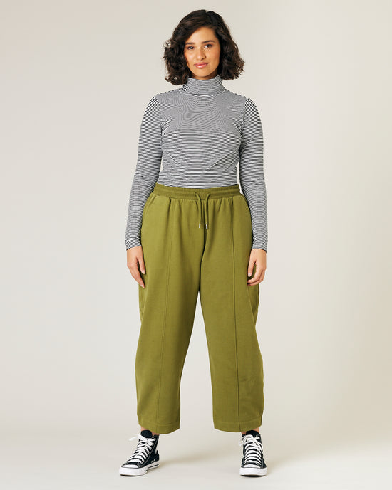 model wears jenny avocado fleece jersey trousers