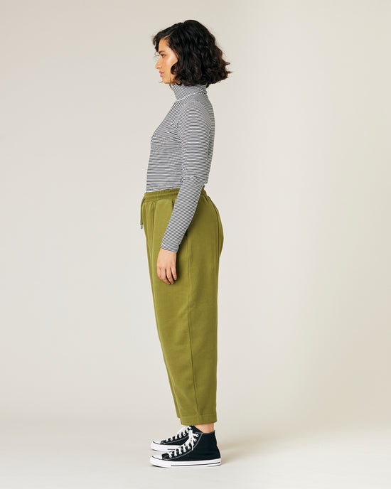 model wears jenny avocado fleece jersey trousers