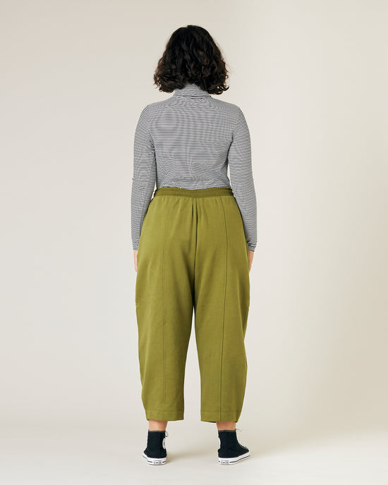 model wears jenny avocado fleece jersey trousers