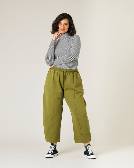 model wears jenny avocado fleece jersey trousers