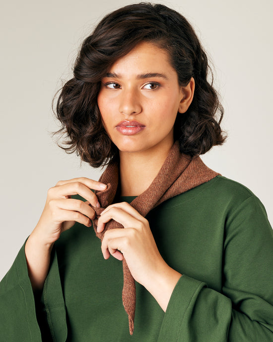 model wears knitted hazelnut neckerchief