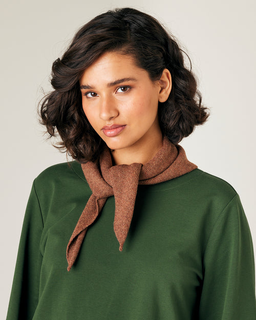 model wears knitted hazelnut neckerchief