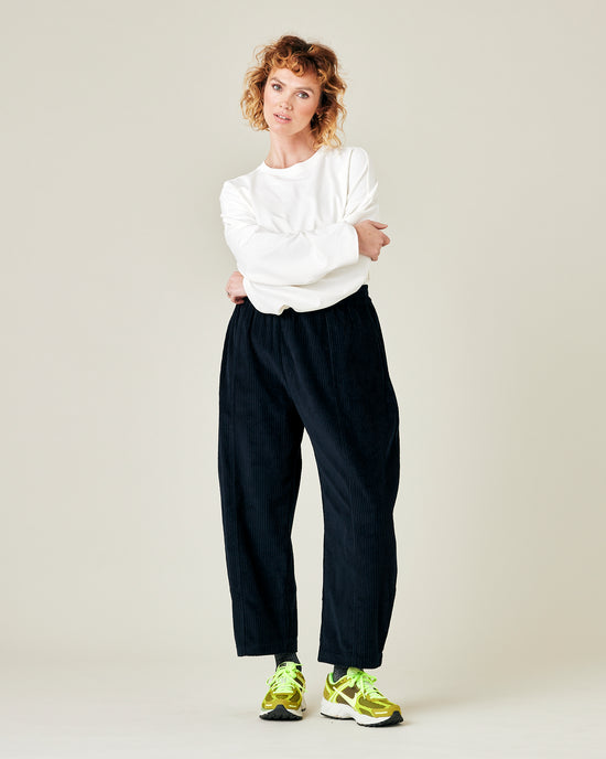 model wears true navy cord mabel trousers