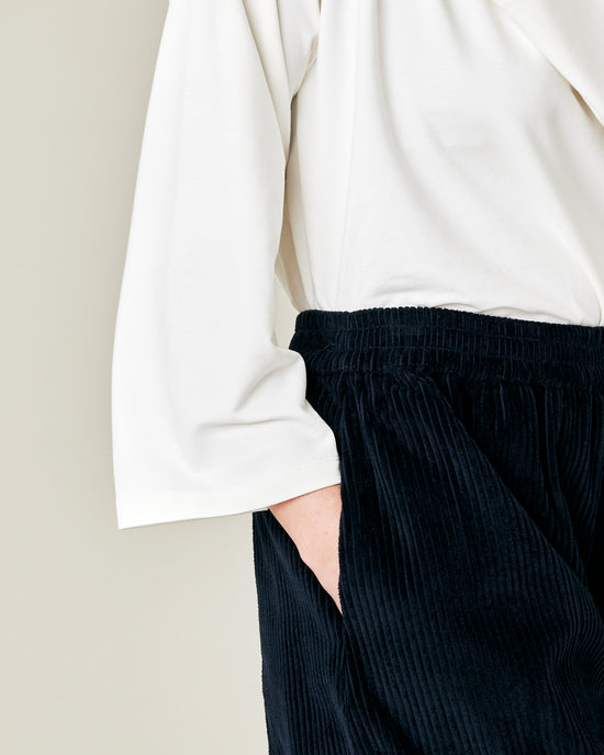 model wears true navy cord mabel trousers