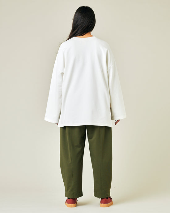 model wears olive jersey mabel trousers