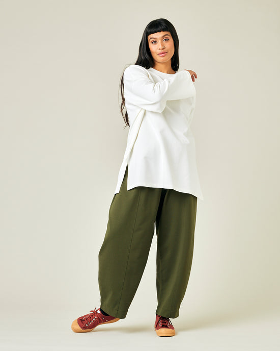 model wears olive jersey mabel trousers