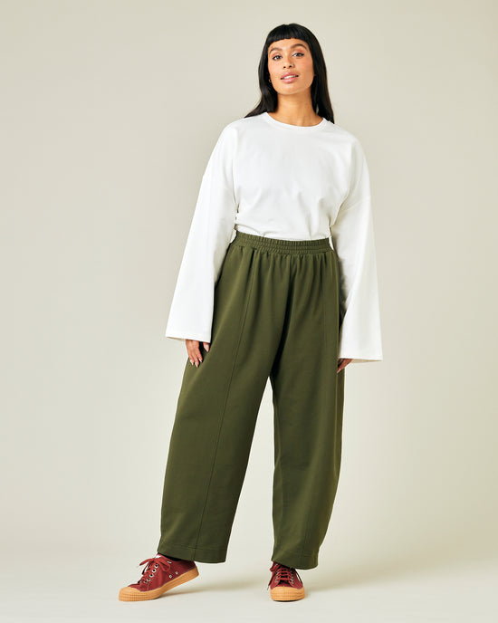 model wears olive jersey mabel trousers