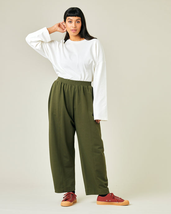 model wears olive jersey mabel trousers