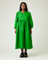 model wears green and black check linen isabel dress