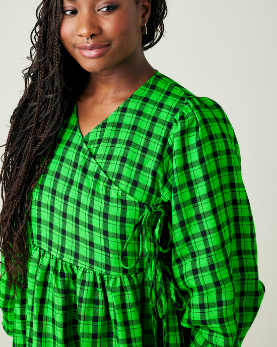 model wears green and black check linen isabel dress