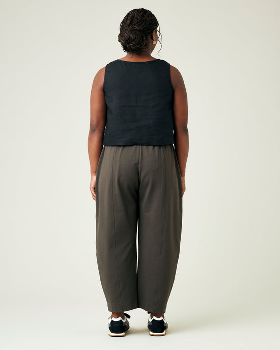 model wears espresso jersey mabel trousers