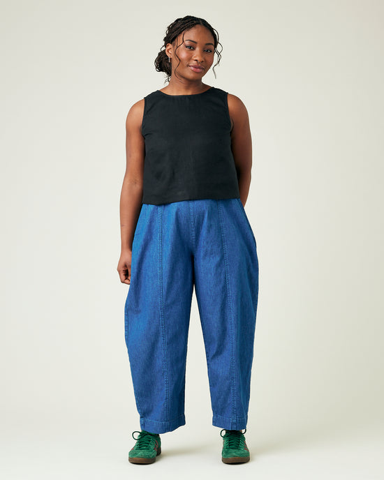 model wears mid wash chambray mabel trousers