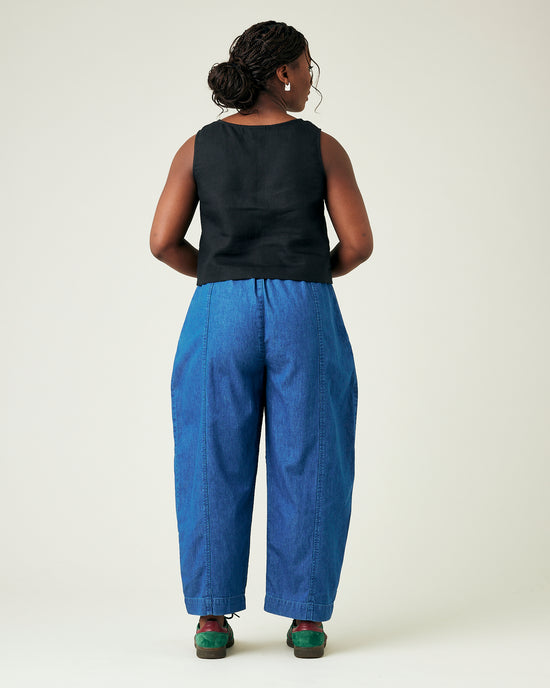 model wears mid wash chambray mabel trousers